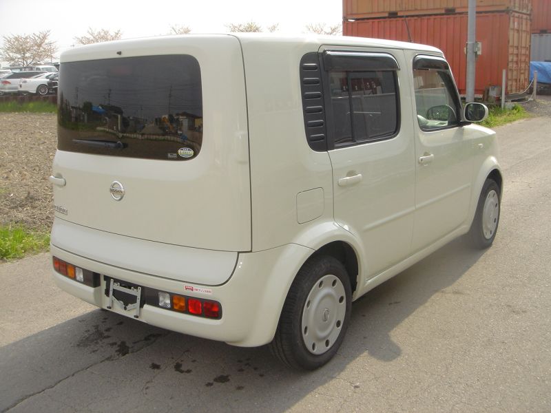 Nissan cube 2004 год